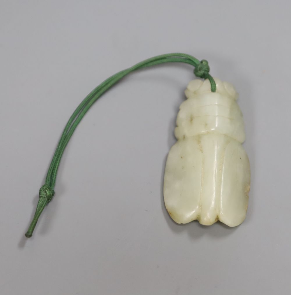 A Chinese carved jade cicada pendant, 5.5cm